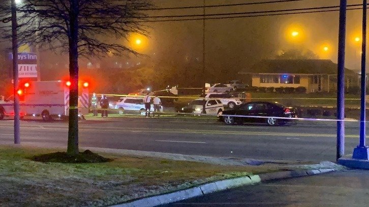 The cordoned-off Days Inn/Azteca Mexican Restaurant parking lot on E Woodlawn, south Charlotte, where the shooting took place