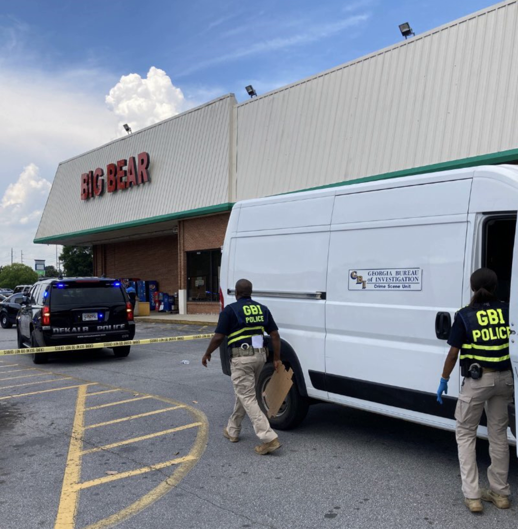 GBI officers outside the Big Bear grocery store in DeKalb County