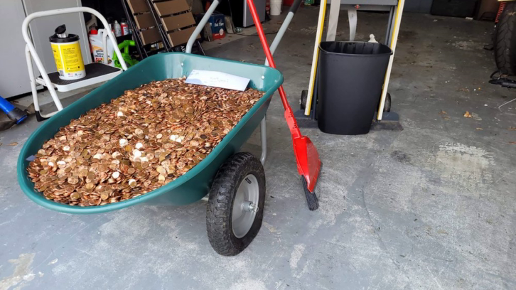 wheelbarrow full of the greasy pennies dumped on a Georgia man’s driveway as his final paycheck