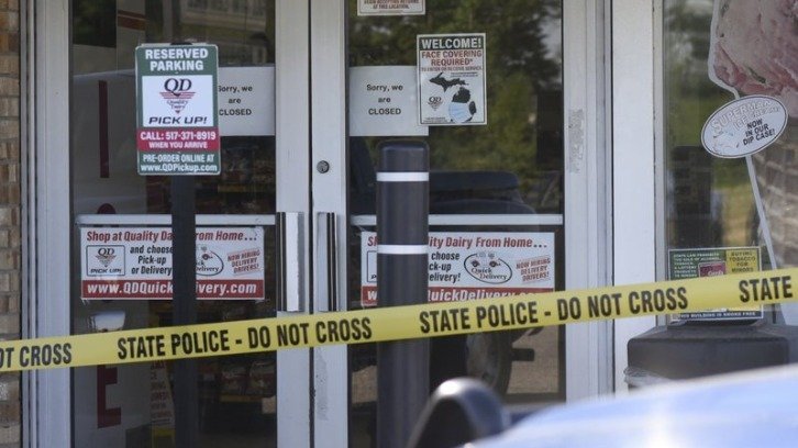 The scene outside the store in Windsor Township, Michigan, where Sean Ruis is believed to have stabbed a elderly man who confronted him about not wearing a mask