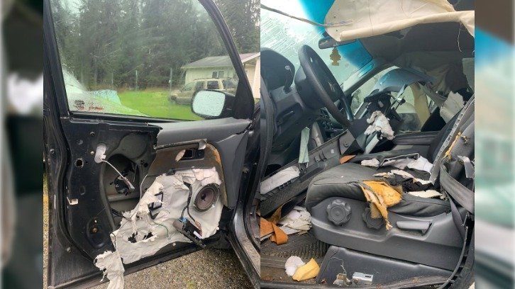 photos showing extensive damage to interior of pizza delivery car