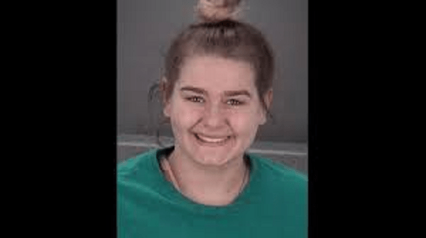 Mugshot of Florida woman Serina Probus smiling after her arrest