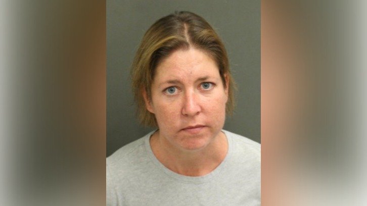 Police mugshot of Sarah Boone of Winter Park, Florida, who is accused of zipping her boyfriend inside a suitcase and leaving him to die