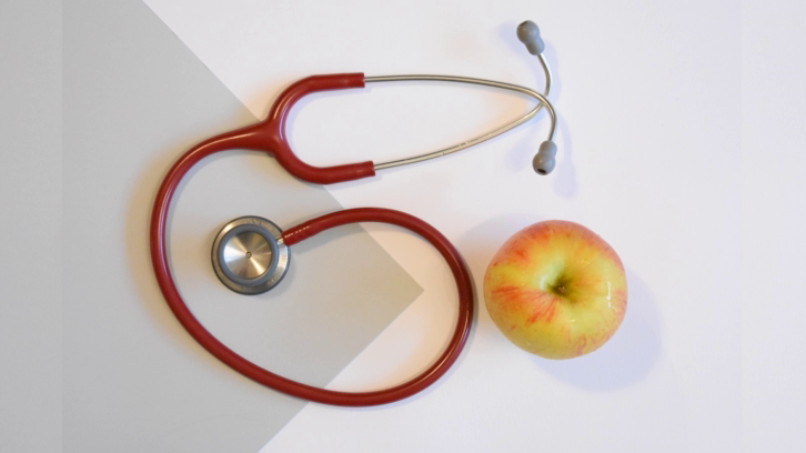 stethoscope and apple