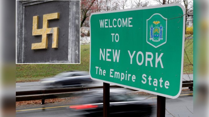 swastika and welcome to New York sign