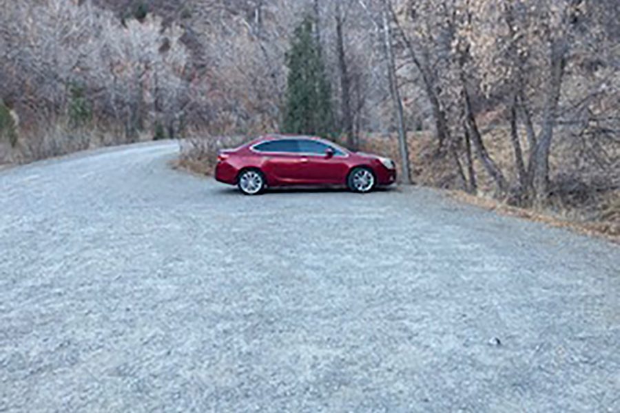 The woman's abandoned red sedan, found in a parking lot near the Dry Canyon Trailhead in Diamond Fork Canyon