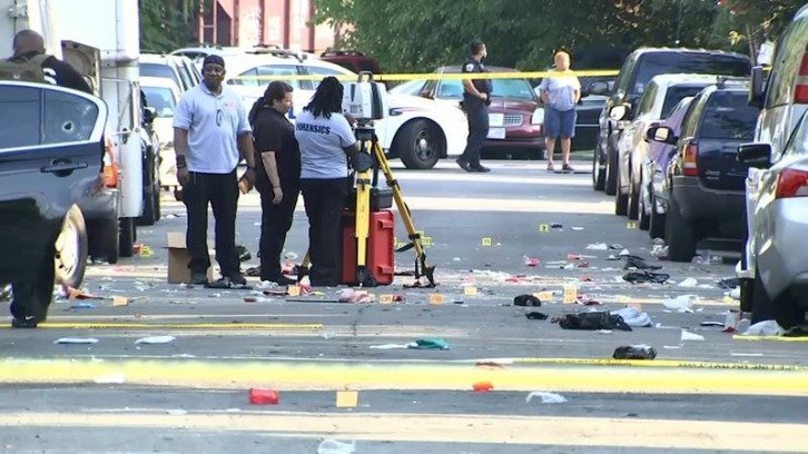 Law enforcement on Sunday working the scene of the shooting in Southeast Washington, D.C.