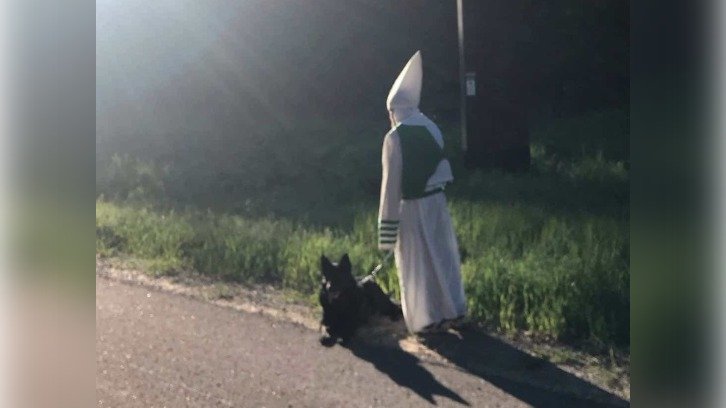 Wisconsin man in KKK hood and robe walking his dog